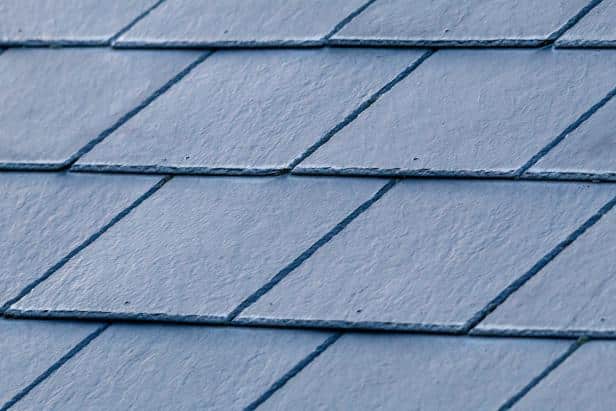 Synthetic Slate vs. Real Slate Roofs: Weighing the Pros and Cons