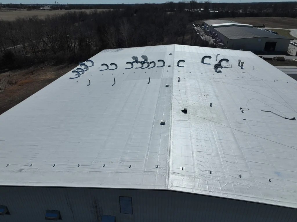 Completed membrane roof retrofit on a commercial building in Columbia, Missouri
