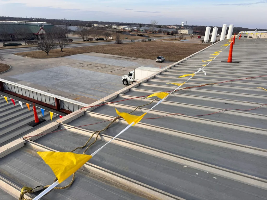 New wood nailer and blocking along the perimeter of a standing seam metal roof